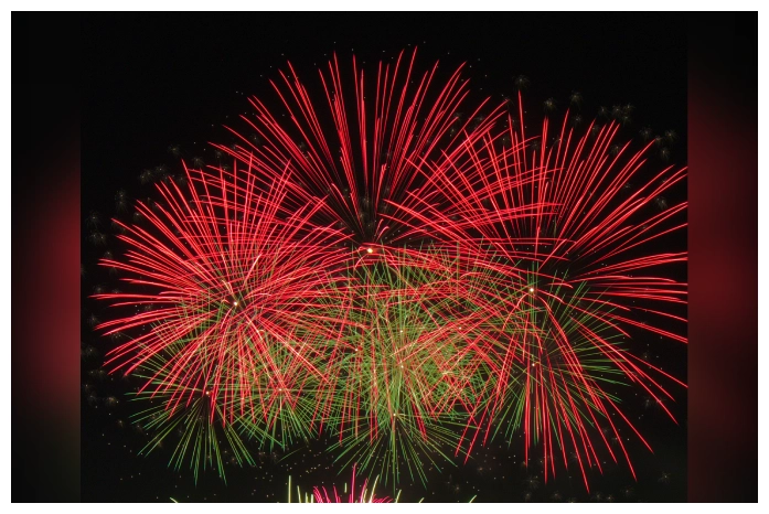 Colorful fireworks display in night sky.